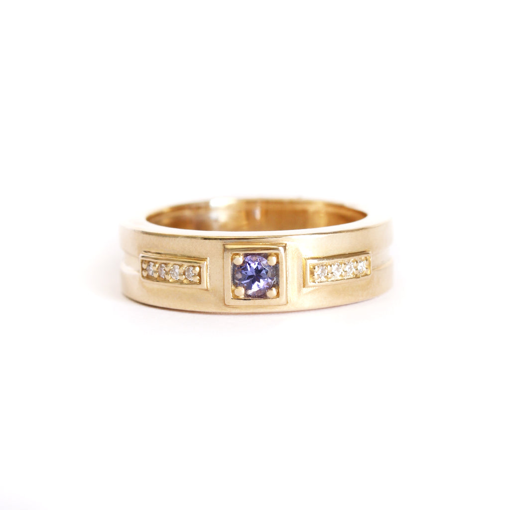 African King Tanzanite with Diamond Highlight Yellow Gold Band