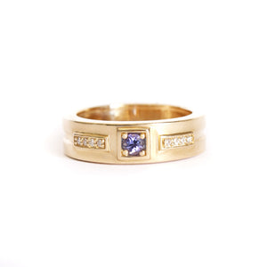 African King Tanzanite with Diamond Highlight Yellow Gold Band