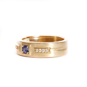 African King Tanzanite with Diamond Highlight Yellow Gold Band