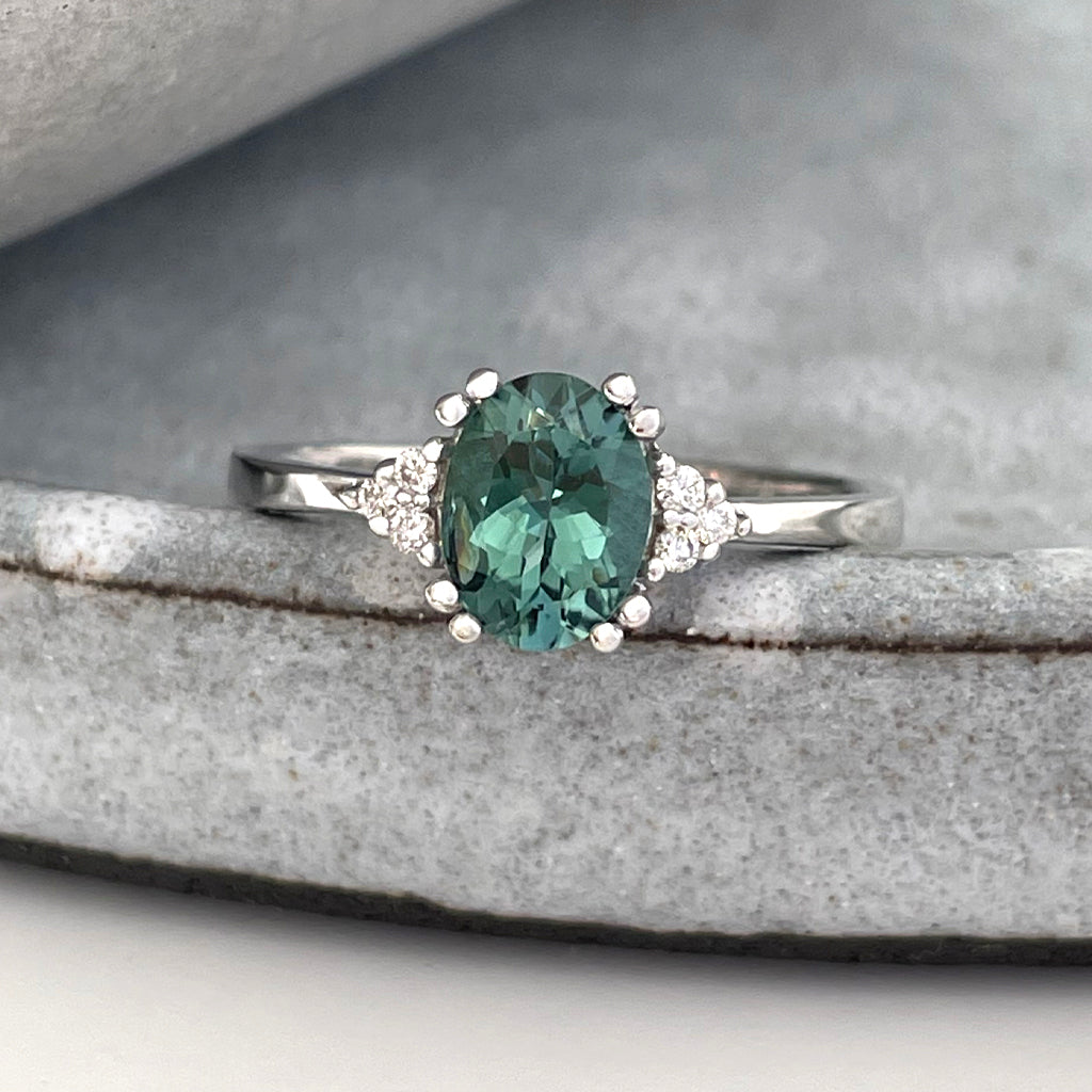 Breathtaking Oval Cut Sea Green Tourmaline With Trilogy Diamond Shoulder Highlight Ring