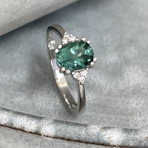 Breathtaking Oval Cut Sea Green Tourmaline With Trilogy Diamond Shoulder Highlight Ring