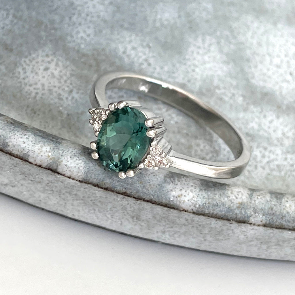 Breathtaking Oval Cut Sea Green Tourmaline With Trilogy Diamond Shoulder Highlight Ring