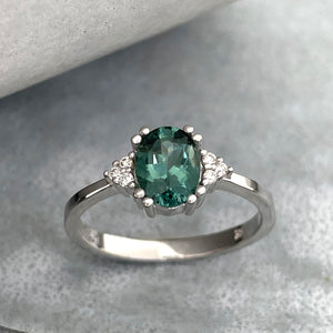 Breathtaking Oval Cut Sea Green Tourmaline With Trilogy Diamond Shoulder Highlight Ring