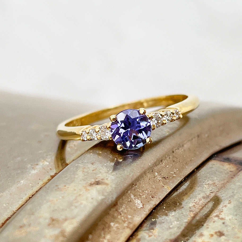 Tanzanite and diamond band engagement ring