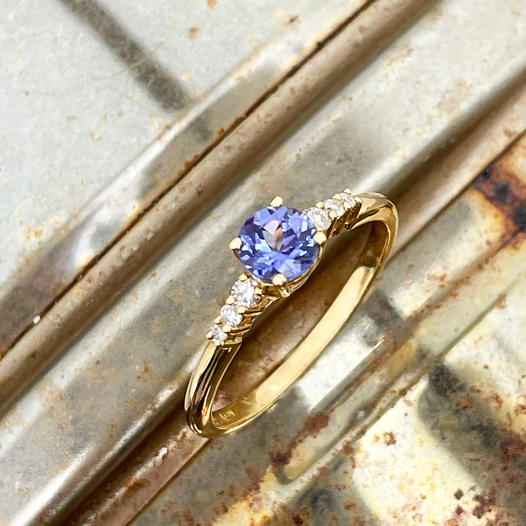 Tanzanite and diamond band engagement ring