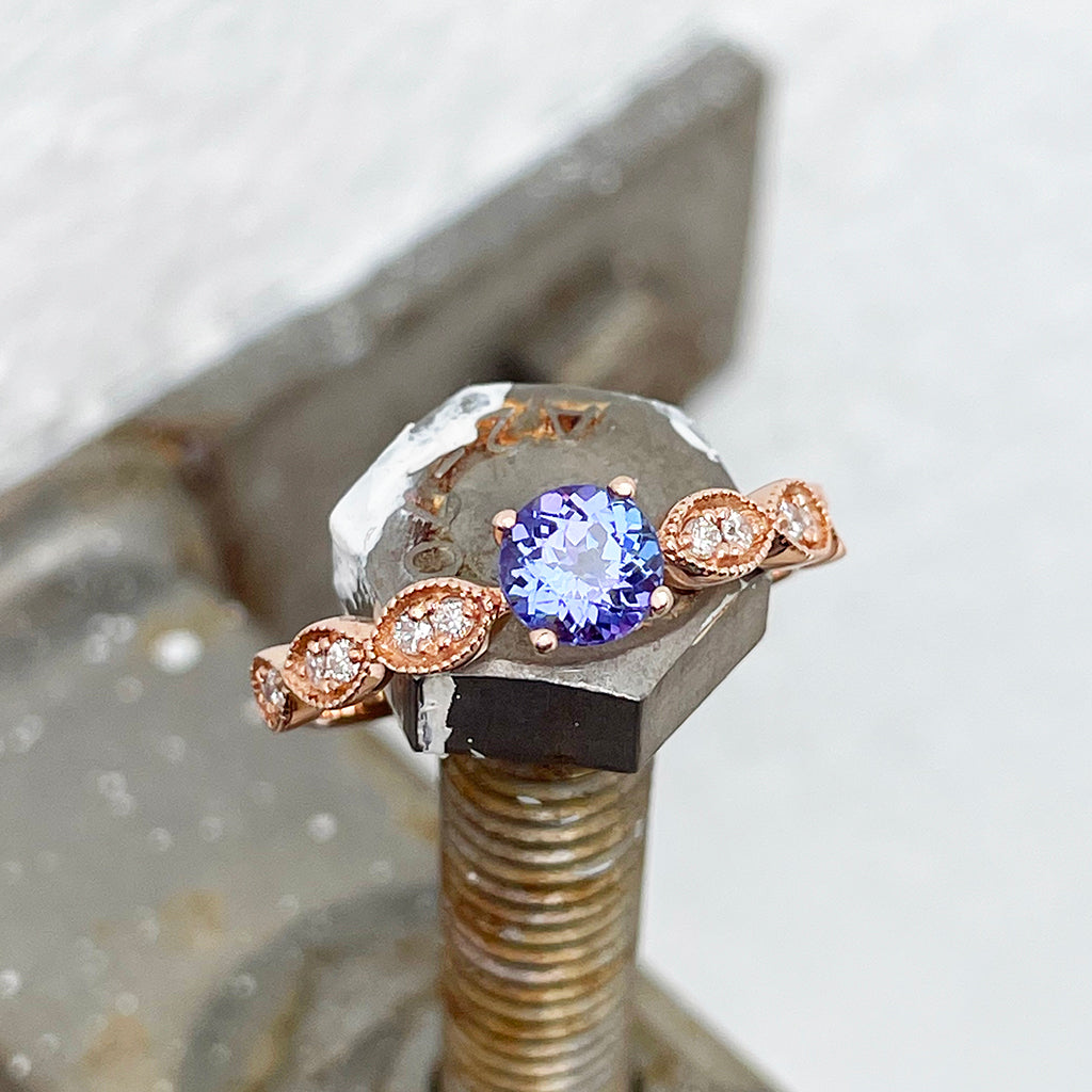 Tanzanite and diamond rose gold ring