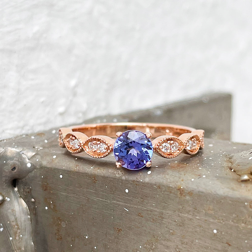 Tanzanite and diamond rose gold rin
