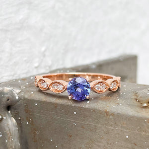 Tanzanite and diamond rose gold rin
