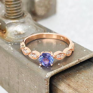 Tanzanite and diamond rose gold ring