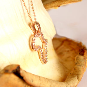 Diamond Studded Africa Rose Gold Pendant