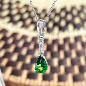 Diamond and tsavorite pendant