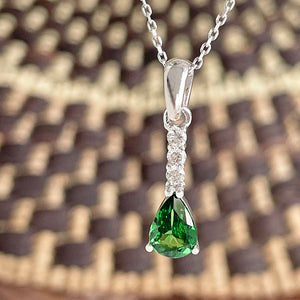 Diamond and tsavorite pendant