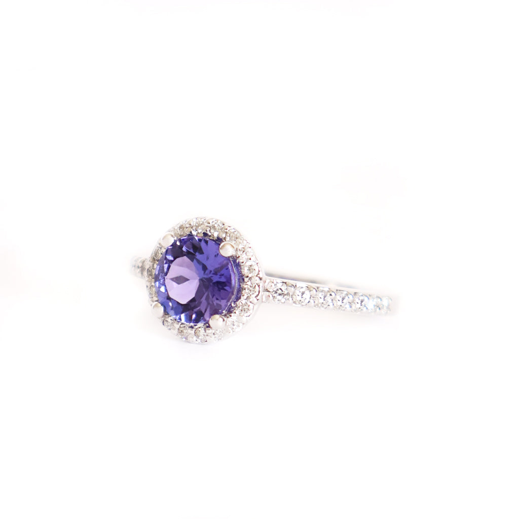 Elegance Defined Round Tanzanite and Diamond Halo White Gold Ring