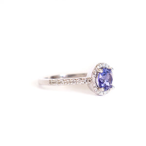 Elegance Defined Round Tanzanite and Diamond Halo White Gold Ring