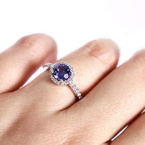 Elegance Defined Round Tanzanite and Diamond Halo White Gold Ring