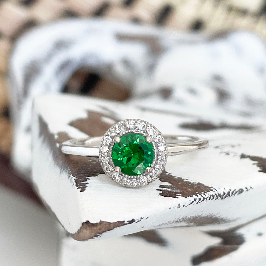 tsavorite and diamond halo ring