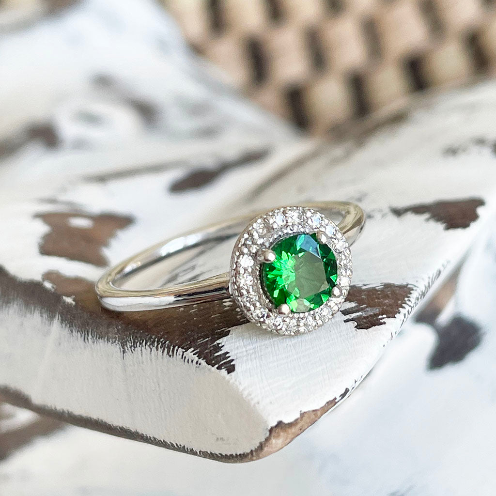 tsavorite and diamond halo ring