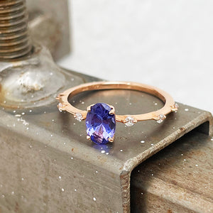 Tanzanite and diamond rose gold ring