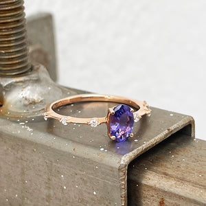 Tanzanite and diamond rose gold ring