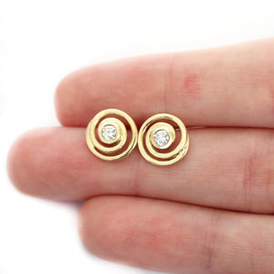 Flirty Infinity White Diamond Yellow Gold Swirl Studs