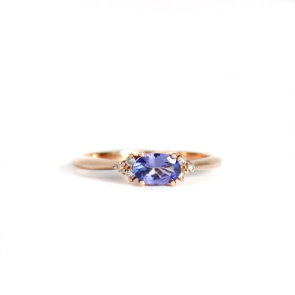 Gorgeously Petite Diamond Trilogy Highlight Oval Tanzanite Rose Gold Ring