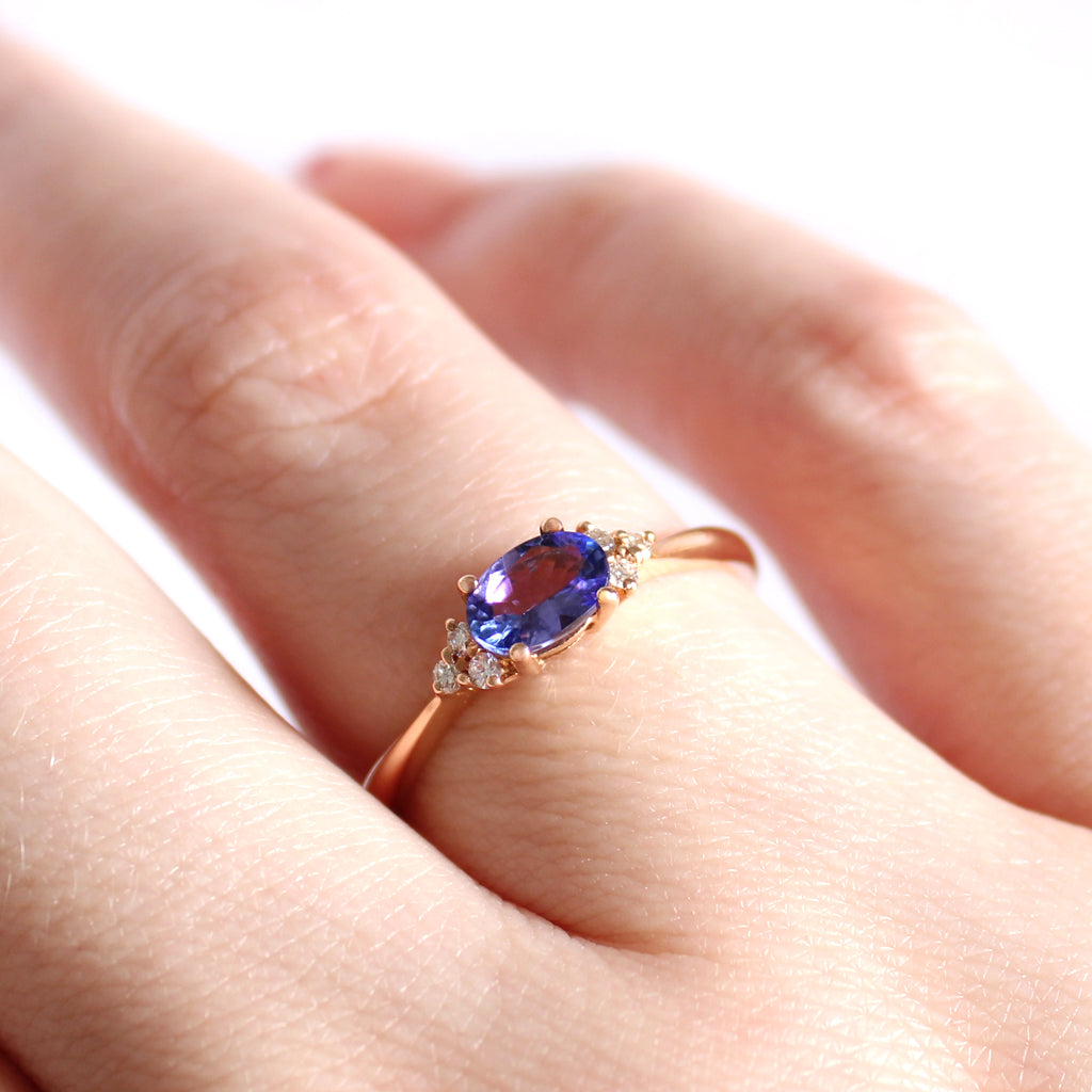 Gorgeously Petite Diamond Trilogy Highlight Oval Tanzanite Rose Gold Ring