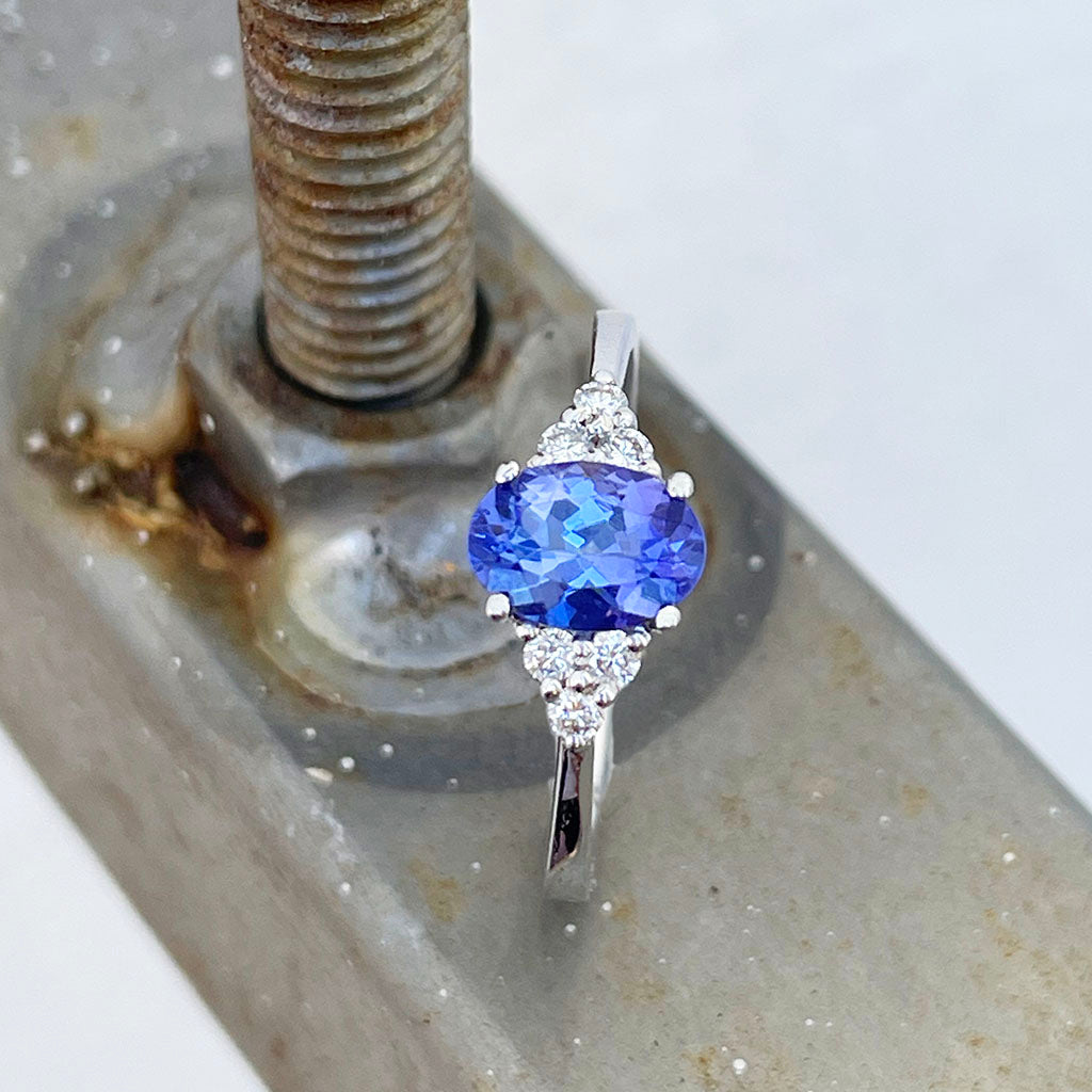 Oval Tanzanite and trilogy diamond ring