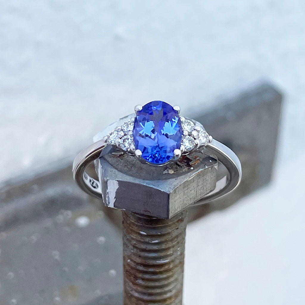 Oval Tanzanite and trilogy diamond ring