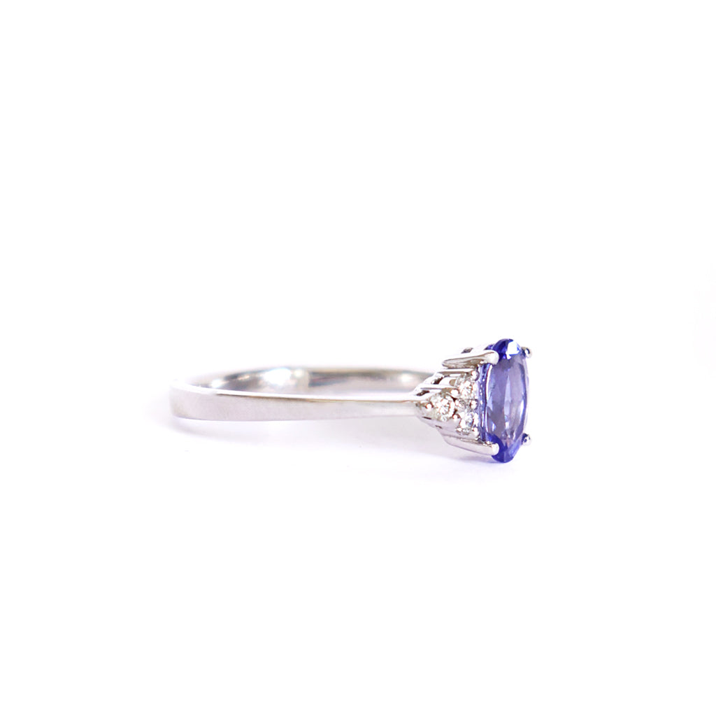 Grace Defined Oval Tanzanite and Trilogy Diamond White Gold Ring