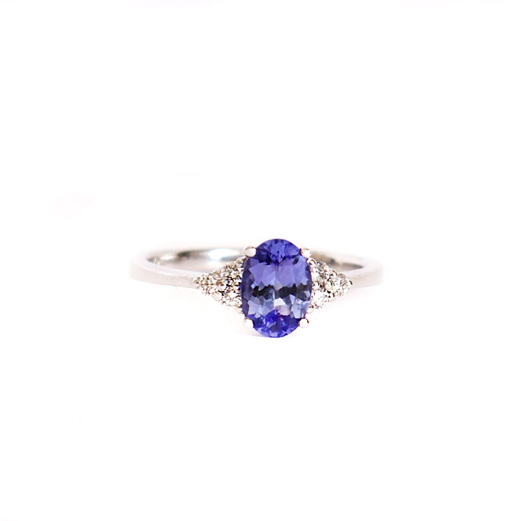 Grace Defined Oval Tanzanite and Trilogy Diamond White Gold Ring