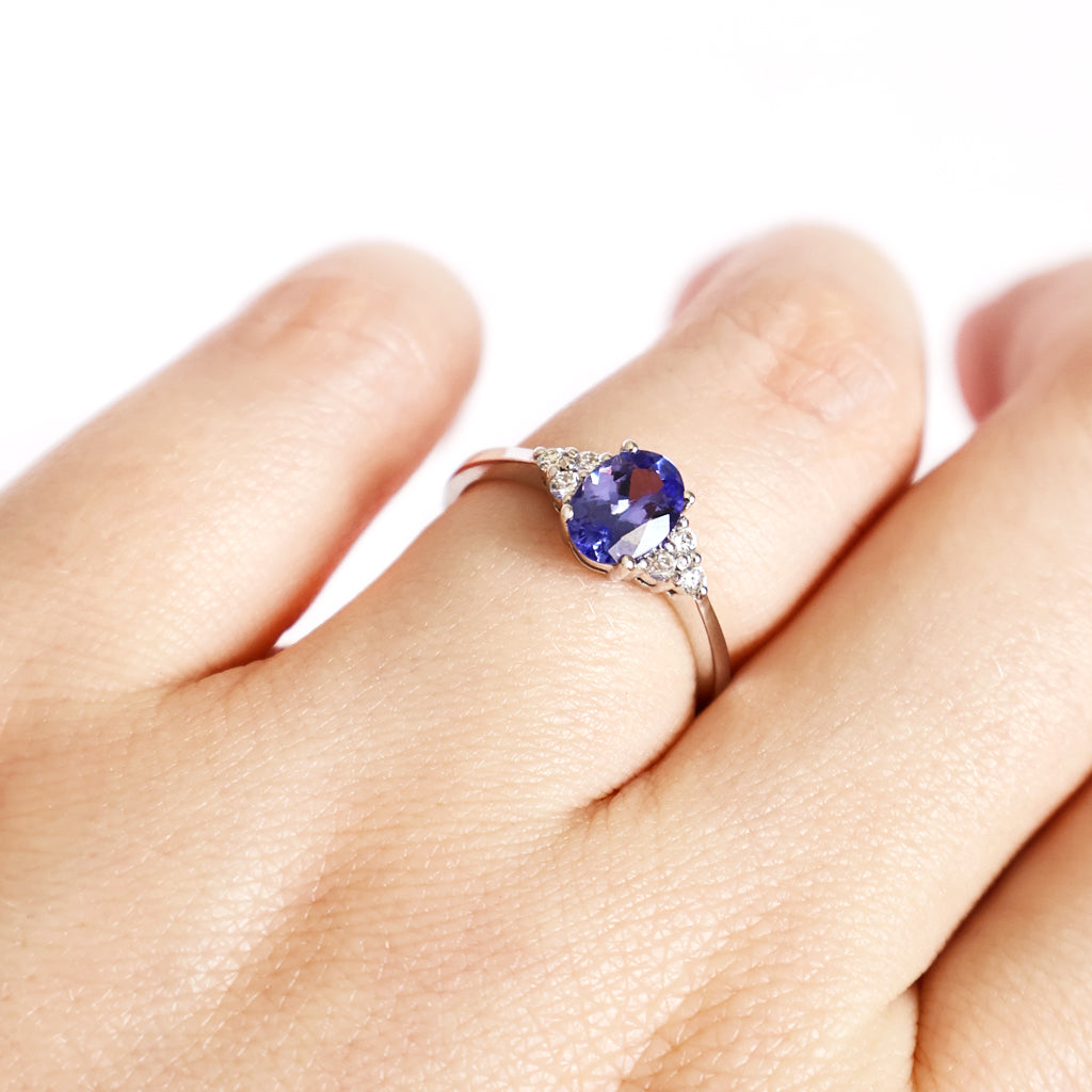 Grace Defined Oval Tanzanite and Trilogy Diamond White Gold Ring