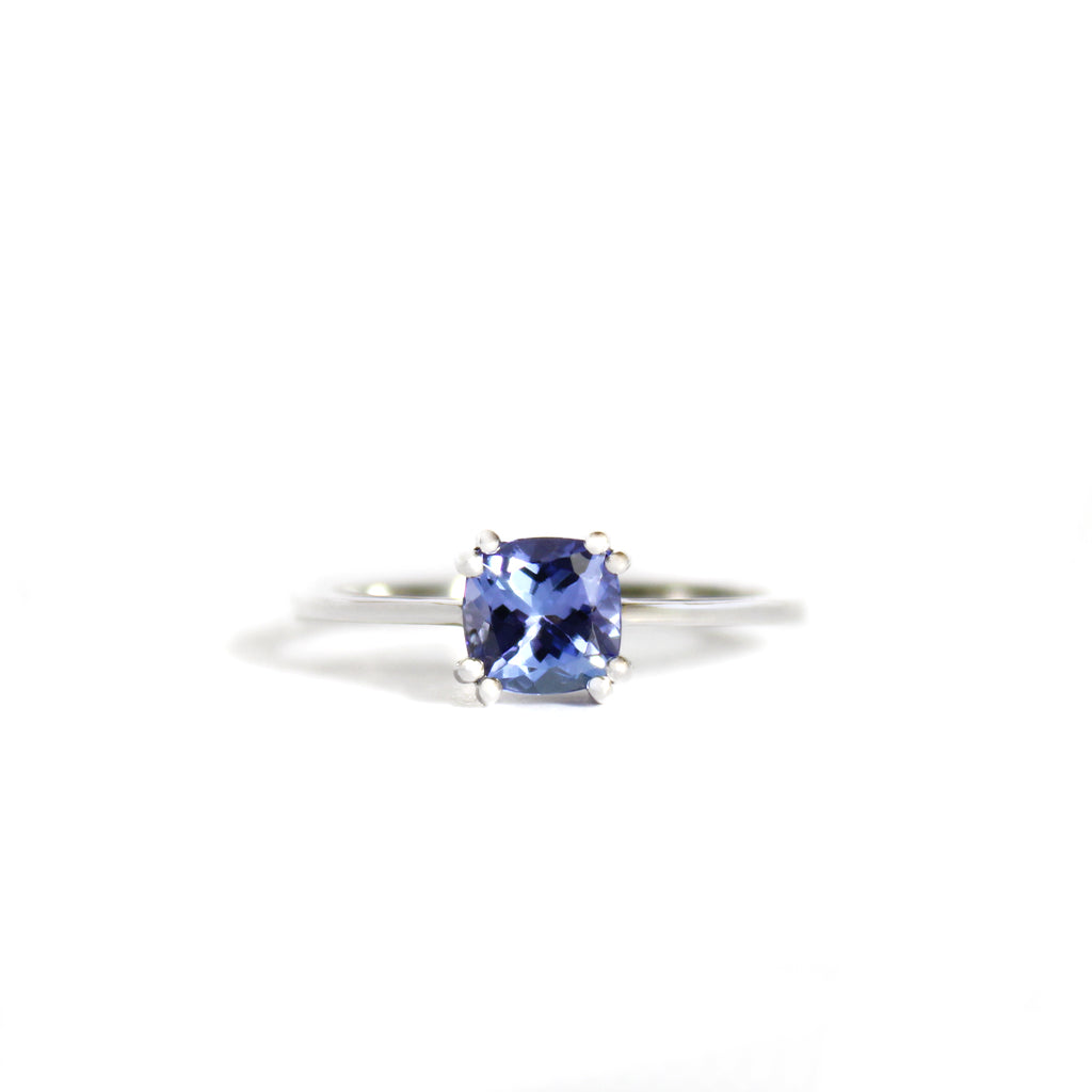 Gracefully Elevated Cushion Cut Four Claw White Gold Tanzanite Ring