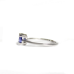 Gracefully Elevated Cushion Cut Four Claw White Gold Tanzanite Ring