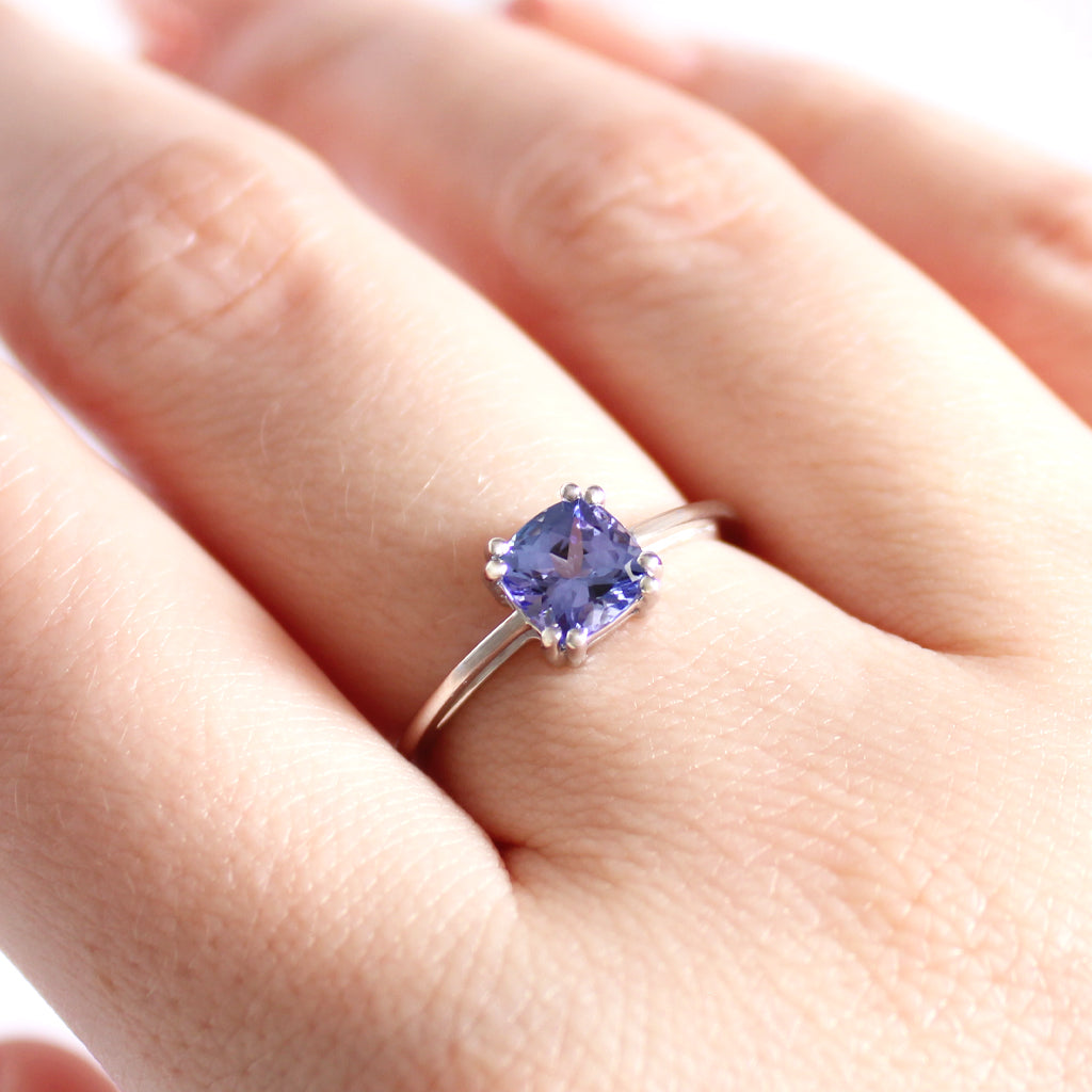 Gracefully Elevated Cushion Cut Four Claw White Gold Tanzanite Ring