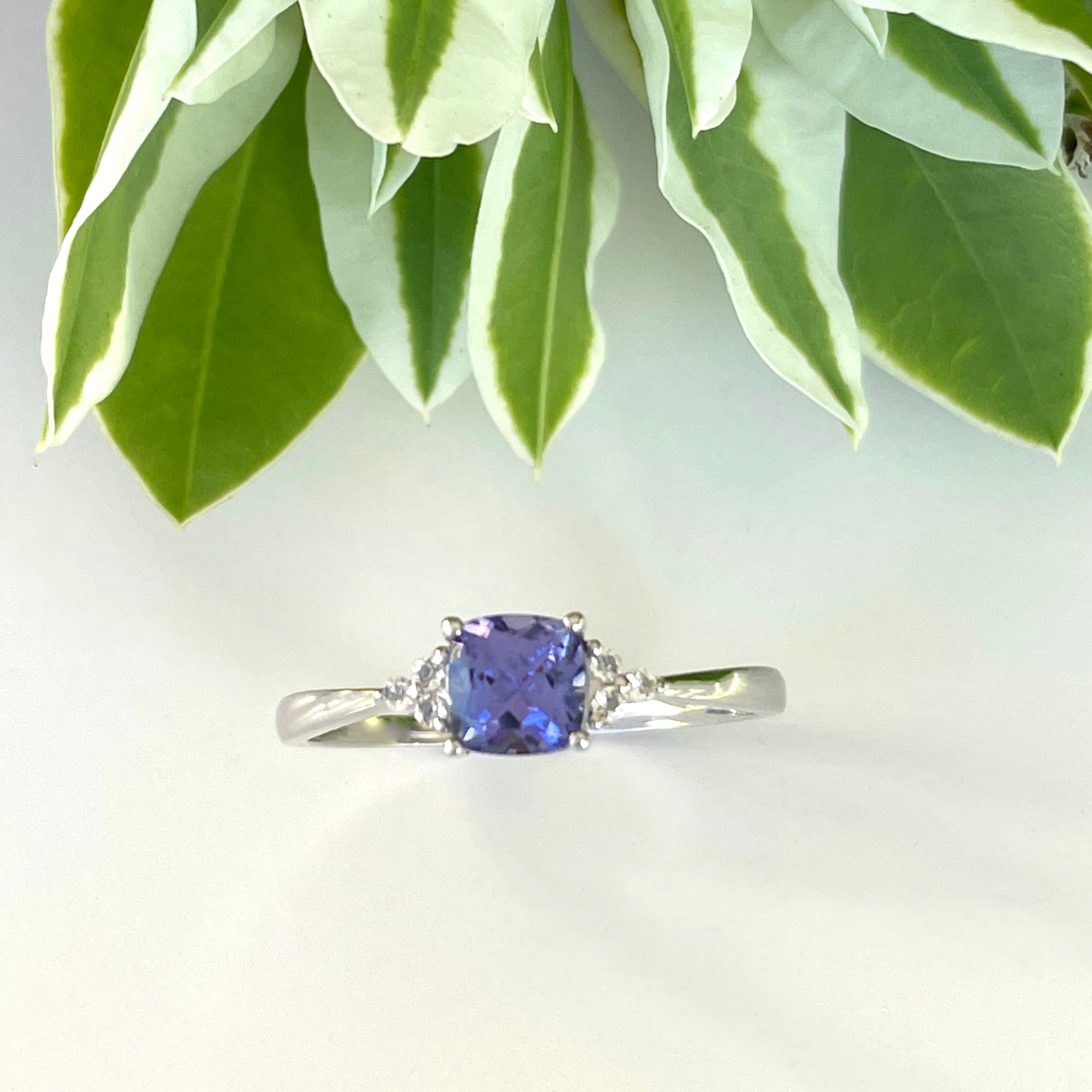 Silver Petite Cushion Cut Tanzanite with Trilogy Silver Topaz Highlight Ring