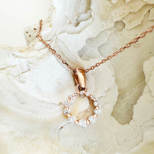 Subtle Crescendo Looped White Diamond Circular Rose Gold Pendant