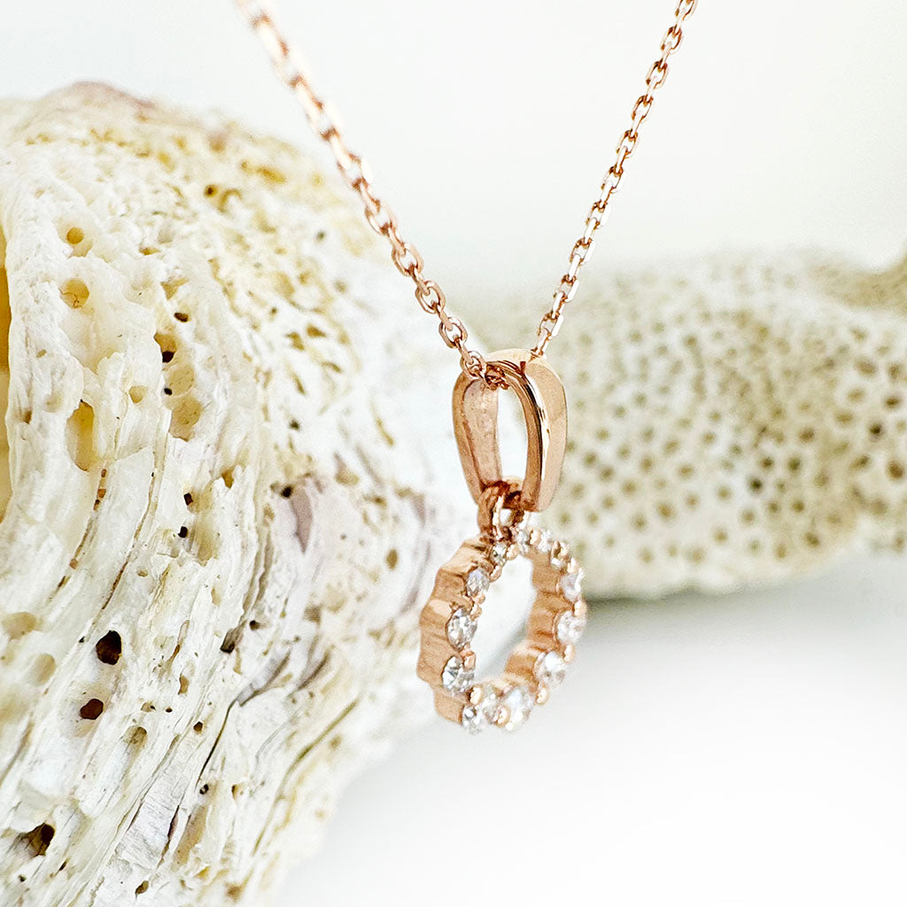 Subtle Crescendo Looped White Diamond Circular Rose Gold Pendant