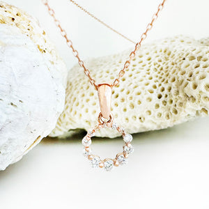 Subtle Crescendo Looped White Diamond Circular Rose Gold Pendant