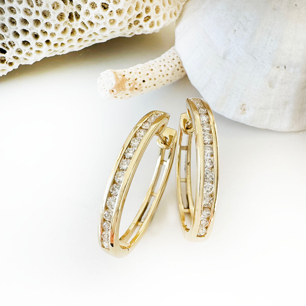 Standout Channel Set White Diamond Hoop Yellow Gold Earrings