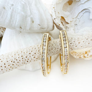 Standout Channel Set White Diamond Hoop Yellow Gold Earrings