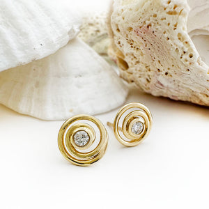 Flirty Infinity White Diamond Yellow Gold Swirl Studs