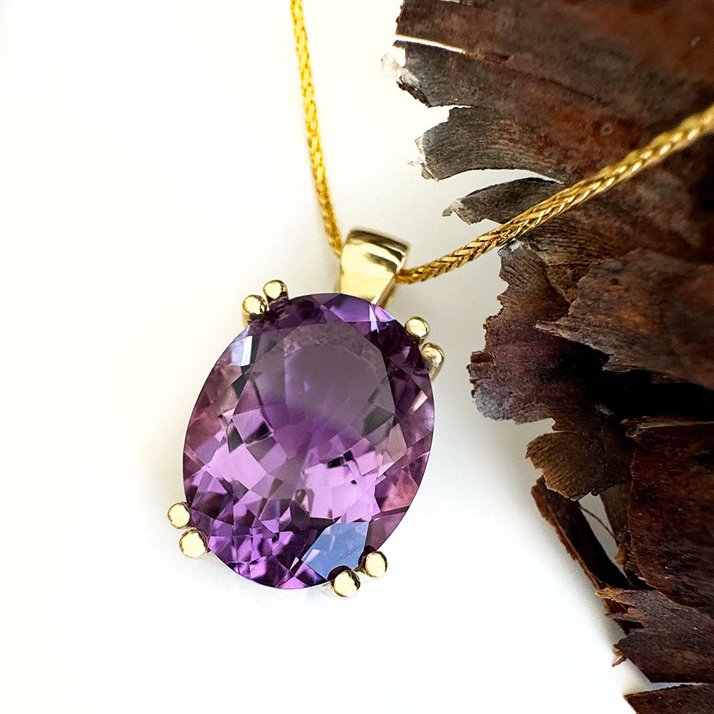 Classic Oval Cut Double Claw Amethyst Yellow Gold Pendant