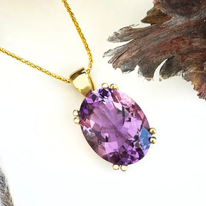 Classic Oval Cut Double Claw Amethyst Yellow Gold Pendant