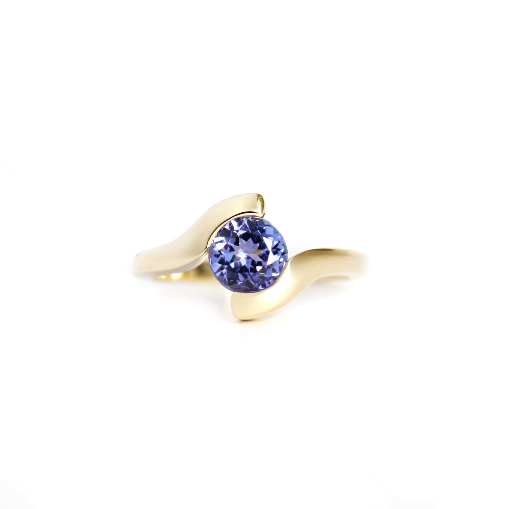 Molten Hot Round Cut Yellow Gold Tanzanite Ring