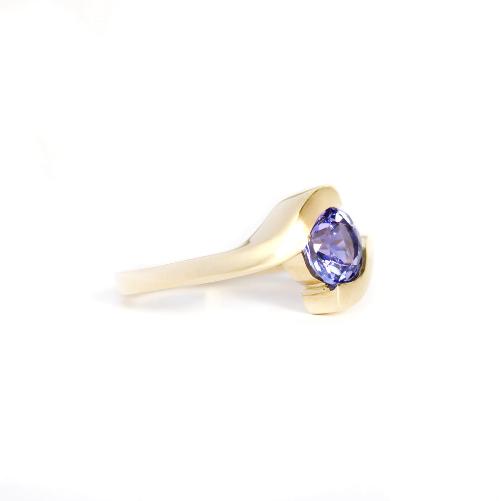 Molten Hot Round Cut Yellow Gold Tanzanite Ring