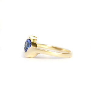 Molten Hot Round Cut Yellow Gold Tanzanite Ring