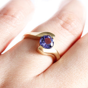 Molten Hot Round Cut Yellow Gold Tanzanite Ring