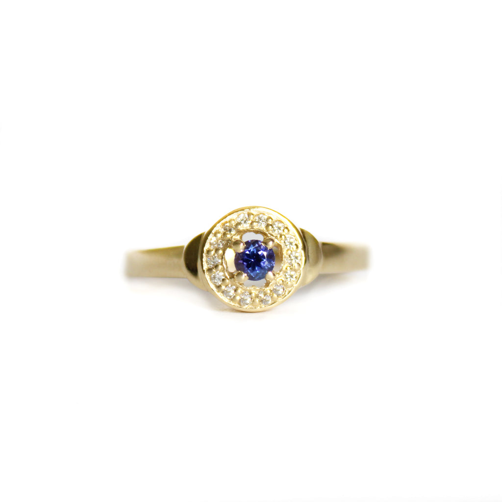 Regally Elevated Tanzanite Diamond Halo Yellow Gold Ring