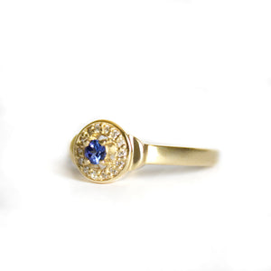 Regally Elevated Tanzanite Diamond Halo Yellow Gold Ring