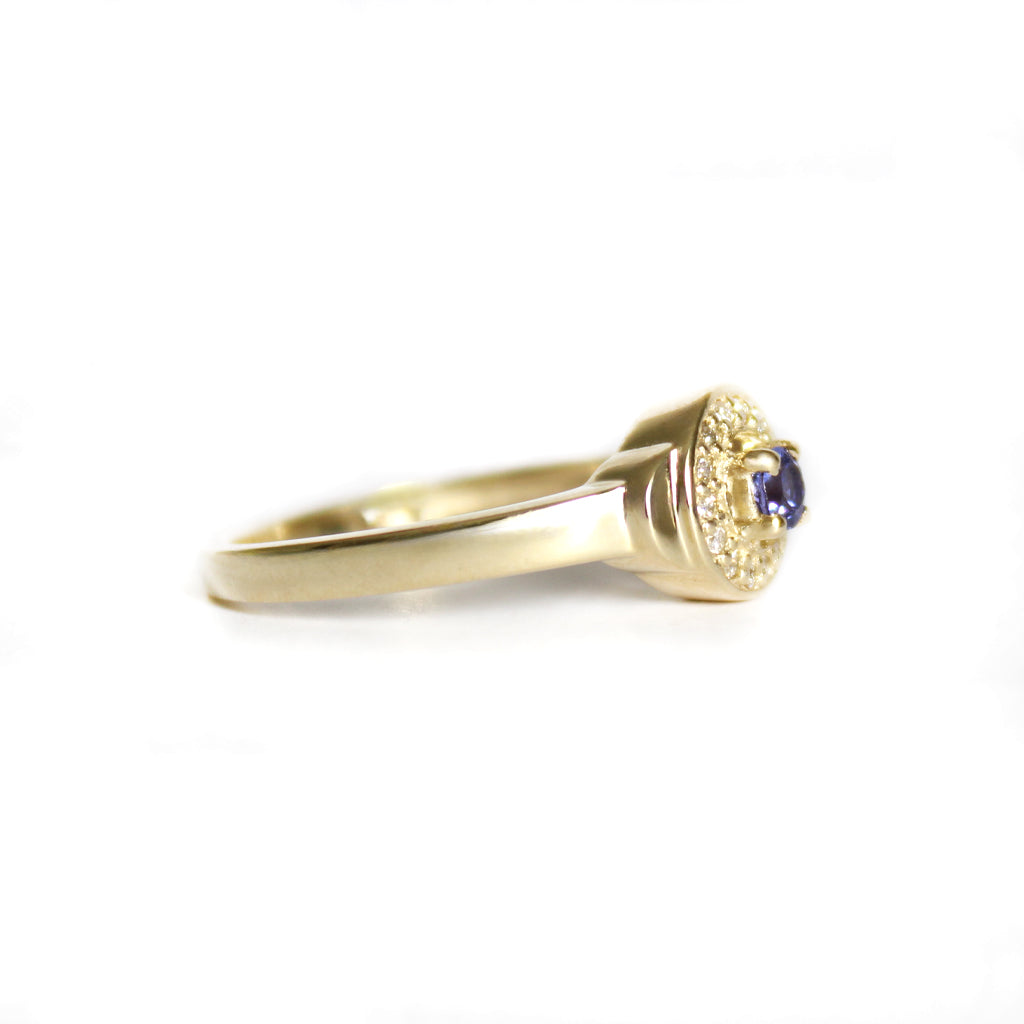 Regally Elevated Tanzanite Diamond Halo Yellow Gold Ring